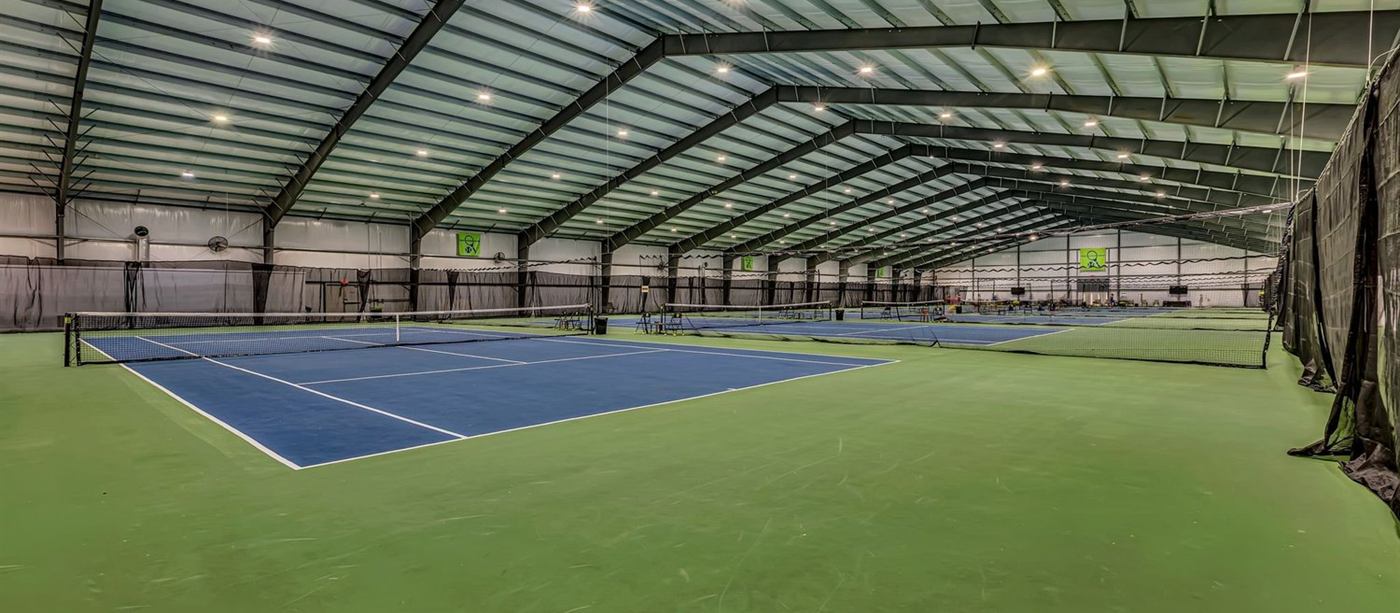 A full-length view down the indoor courts